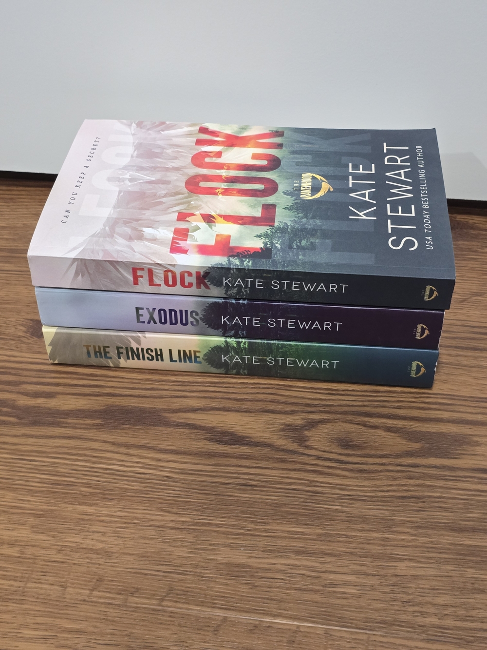 Paperback Book Stack - Flock / Exodus / The Finish Line - Multi-Color